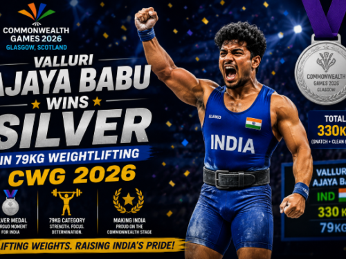 Indian weightlifter Valluri Ajaya Babu celebrating his silver medal win on the podium in Glasgow.