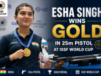 Indian shooter Esha Singh holding her gold medal after winning the women's 25m pistol event at the ISSF World Cup.