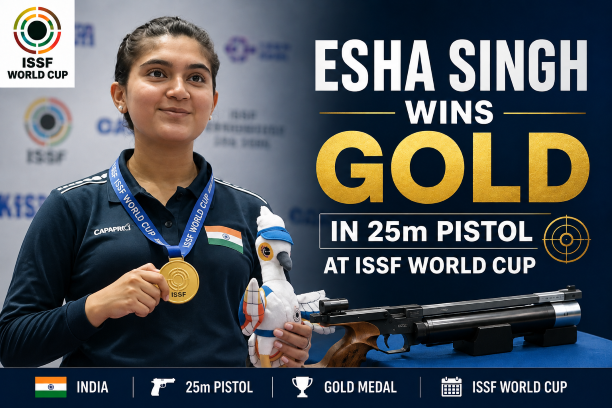 Indian shooter Esha Singh holding her gold medal after winning the women's 25m pistol event at the ISSF World Cup.